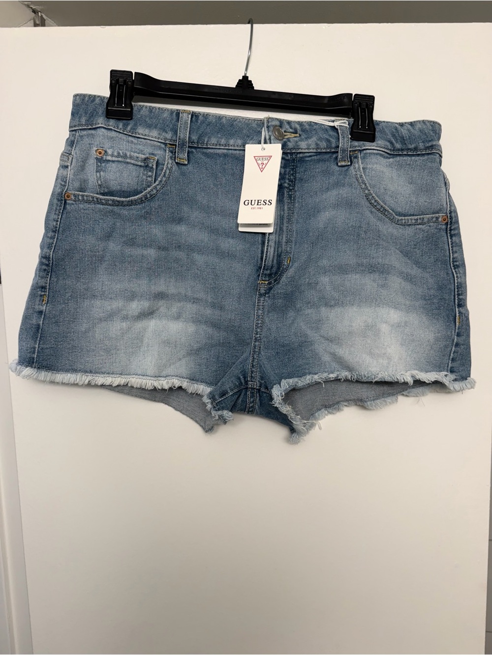 New with tags GUESS Shorts - Distressed Raw Hem
Denim Shorts - Size 31